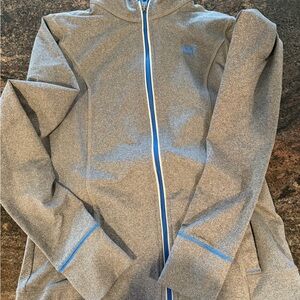 Zip-Up Hoodie with Blue Accents. Light athletic jacket with a reflective stripe